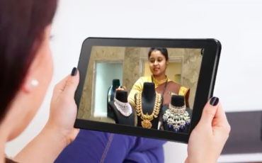 A jewellery sales person is showcasing the store jewellery to their customer using JewelMeet video calling feature